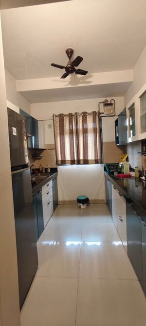 Kitchen in 2.5 BHK Apartment at Lodha Splendora, Ghodbunder Road – for Sale