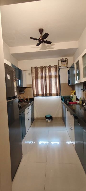 Kitchen in 2.5 BHK Apartment at Lodha Splendora, Ghodbunder Road – for Sale
