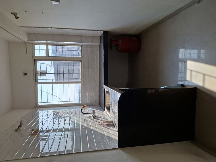 Kitchen, pooja-alka-uttam-enclave 2 Bedroom 800 Sq.Ft. Builder Floor In Mundhwa Pune 10110005