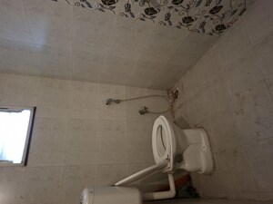Bathroom in 2 BHK Builder Floor at Pooja Alka Uttam Enclave, Mundhwa – for Rent