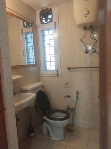 Bathroom in 3 BHK Apartment at Unitech Uniworld Gardens 2, Sector 47 – for Rent