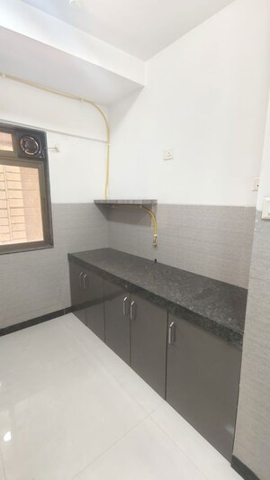 Kitchen in 2 BHK Apartment at Acme Ozone, Manpada – for Rent