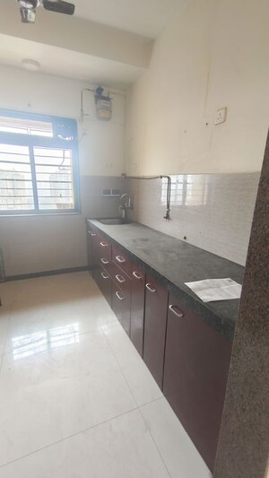 Kitchen in 2 BHK Apartment at Acme Ozone, Manpada – for Rent
