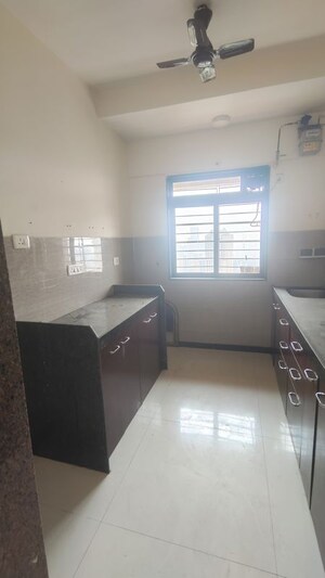 Kitchen in 2 BHK Apartment at Acme Ozone, Manpada – for Rent