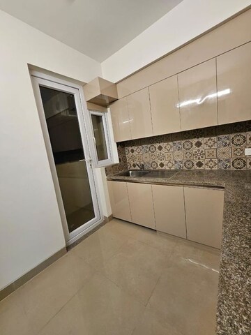 Kitchen in 2.5 BHK Apartment at M3M Woodshire, Sector 107 – for Rent