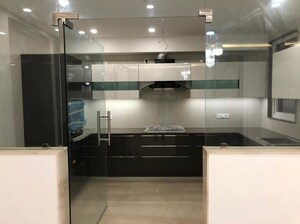 Kitchen in 4 BHK Apartment at DLF The Aralias, Sector 42 – for Sale