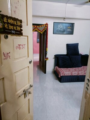 Living Room in 1 BHK Apartment at Lodha Palava City, Dombivli East – for Sale