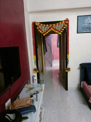 Living Room in 1 BHK Apartment at Lodha Palava City, Dombivli East – for Sale