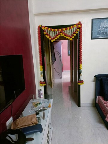 Living Room in 1 BHK Apartment at Lodha Palava City, Dombivli East – for Sale