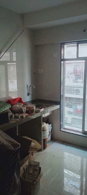 Kitchen in 1 BHK Apartment at Bindra Complex, Andheri East – for Rent