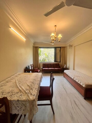 Living Room in 1 BHK Apartment at Seven Bunglow – for Rent