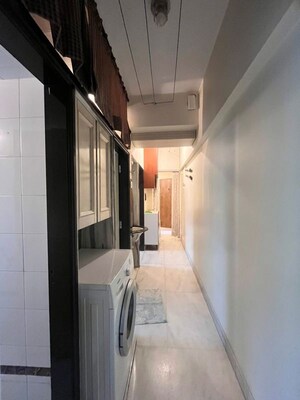 Building Lobby in 1 BHK Apartment at Seven Bunglow – for Rent