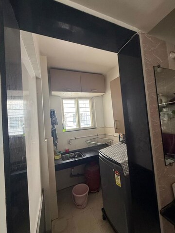 Kitchen in 3 BHK Apartment at Sanwali Apartments, Aundh – for Rent