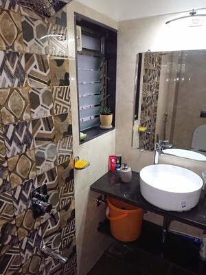 Bathroom in 1 BHK Apartment at Sainath Apartments, Malad West – for Rent