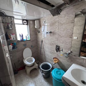 Bathroom in 1 BHK Apartment at D V Shree Shashwat, Pleasant Park – for Sale