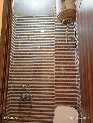 Bathroom in 1.5 BHK Builder Floor at Savitri Nagar – for Rent