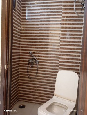 Bathroom in 1.5 BHK Builder Floor at Savitri Nagar – for Rent