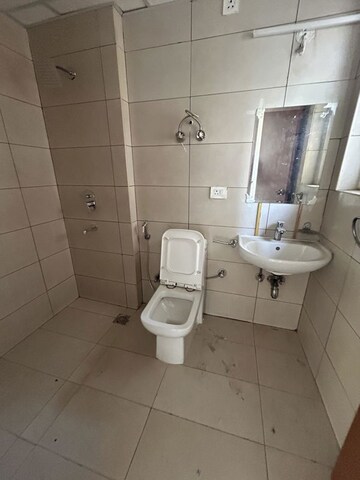 Bathroom in 2 BHK Apartment at Tata Eureka Park, Sector 150 – for Sale