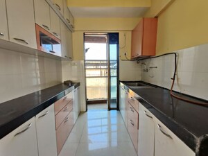Kitchen in 2 BHK Apartment at Runwal Symphony, Santacruz East – for Rent