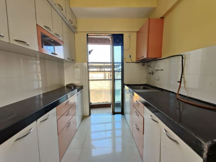 Kitchen, runwal-symphony 2 Bedroom 700 Sq.Ft. Apartment In Santacruz East Mumbai 10110385