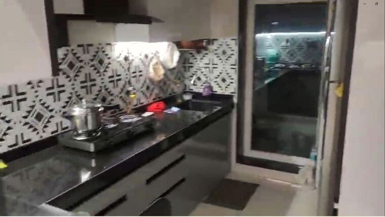Kitchen, rustomjee-azziano-wing-d 2 Bedroom 748 Sq.Ft. Apartment In Thane West Thane 10110380