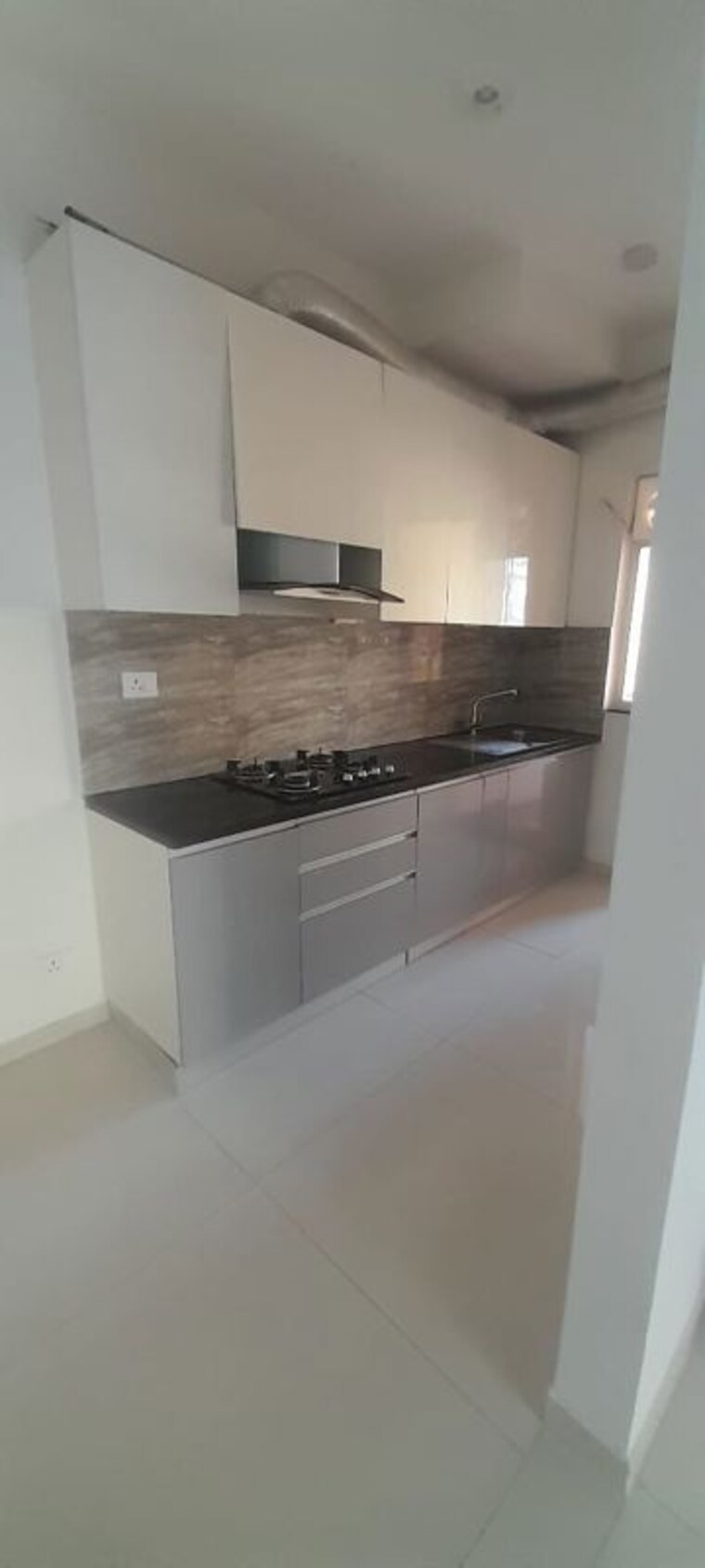 Kitchen, shapoorji-pallonji-joyville-phase-3 2.5 Bedroom 1675 Sq.Ft. Apartment In Sector 102 Gurgaon 10110454