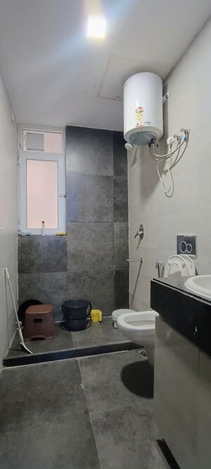 Bathroom in 2 BHK Apartment at Microtek Greenburg, Sector 86 – for Sale