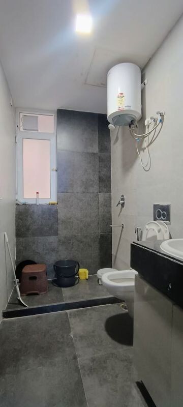 Bathroom in 2 BHK Apartment at Microtek Greenburg, Sector 86 – for Sale