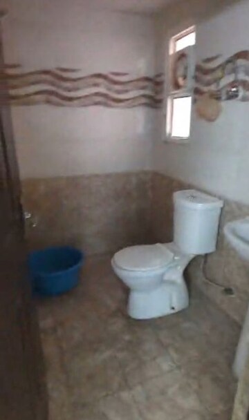 Bathroom in 3 BHK Apartment at JKG Palm Court, Sector 16c Greater Noida – for Rent