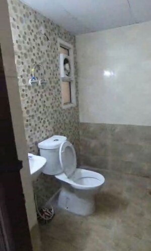 Bathroom in 3 BHK Apartment at JKG Palm Court, Sector 16c Greater Noida – for Rent