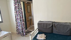 Living Room in 1 BHK Apartment at Sankalpit CHS, Goregaon East – for Rent