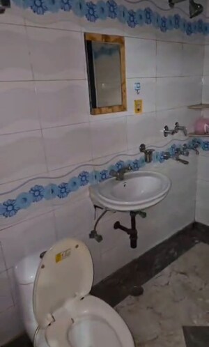 Bathroom in 2 BHK Apartment at Bhasin Apartments, Niti Khand I – for Rent