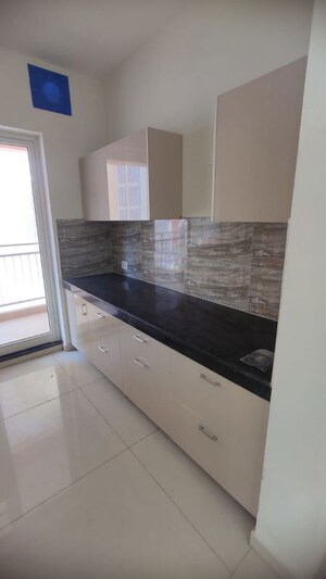 Kitchen in 2 BHK Apartment at Shapoorji Pallonji Joyville Phase 2, Sector 102 – for Rent