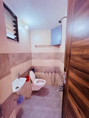 Bathroom in 3 BHK Apartment at Kudasan – for Rent