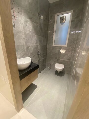Bathroom in 2 BHK Apartment at Raymond The Address By GS, Sion East – for Sale