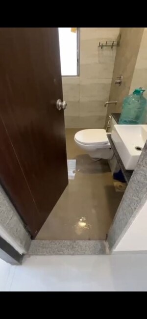Bathroom in 2 BHK Apartment at Ani Anu Sri Balaji Enclave, Malad West – for Rent