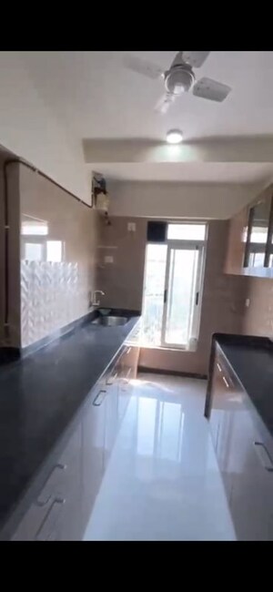 Kitchen in 2 BHK Apartment at Ani Anu Sri Balaji Enclave, Malad West – for Rent