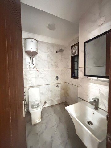 Bathroom in 2 BHK Apartment at Chattarpur – for Rent