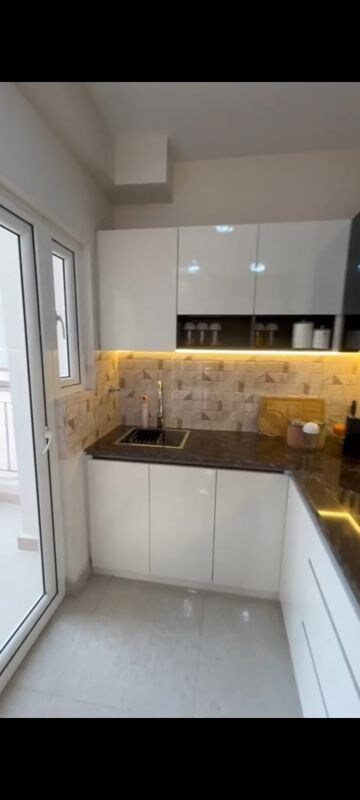Kitchen in 2 BHK Apartment at Kingson ARV Arcade, Raj Nagar Extension – for Sale