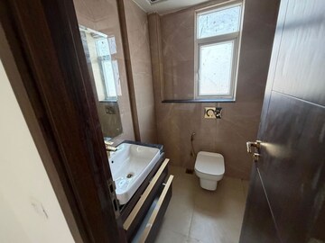 Bathroom in 2 BHK Apartment at Smart World Orchard, Sector 61 – for Rent