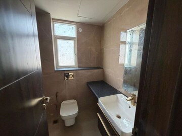 Bathroom in 2 BHK Apartment at Smart World Orchard, Sector 61 – for Rent