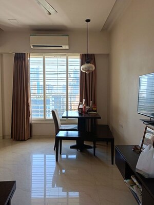 Living Room in 2 BHK Apartment at JP Unity Tower, Lower Parel – for Rent