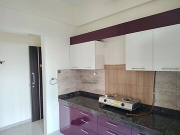 Kitchen in 3 BHK Apartment at Harmony Signature Towers, Owale – for Rent