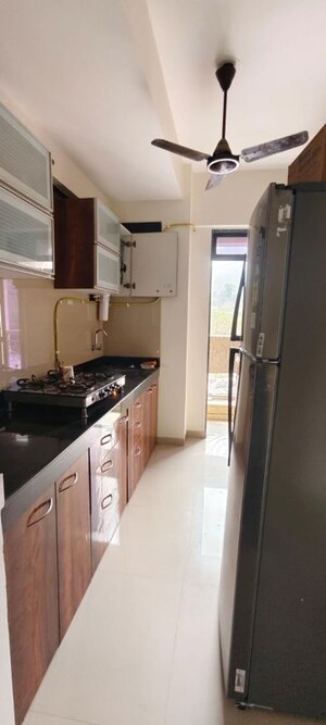 Kitchen in 2 BHK Apartment at Kalpataru Immensa, Kolshet Road – for Rent