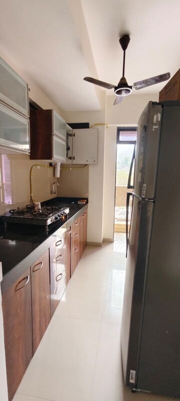 Kitchen in 2 BHK Apartment at Kalpataru Immensa, Kolshet Road – for Rent
