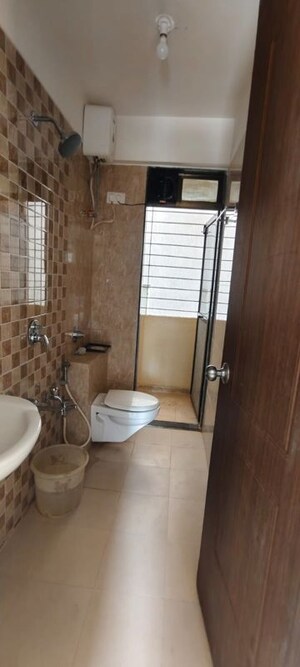 Bathroom in 2 BHK Apartment at Kalpataru Immensa, Kolshet Road – for Rent
