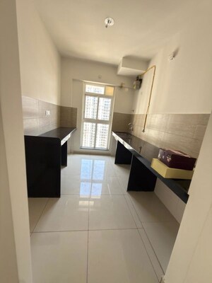 Kitchen in 2 BHK Apartment at Godrej Emerald, Ghodbunder Road – for Rent