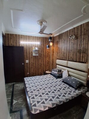 Bedroom in 2 BHK Builder Floor at Rajpur Khurd Extension – for Rent