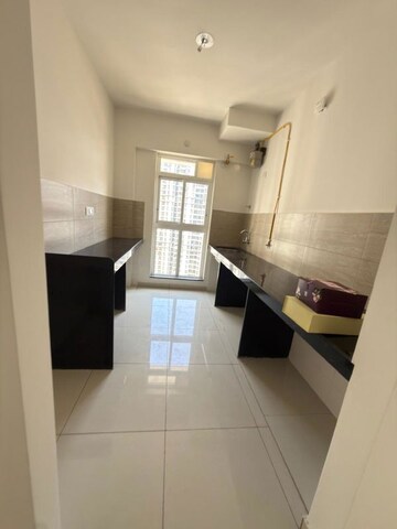 Kitchen in 2 BHK Apartment at Godrej Emerald, Ghodbunder Road – for Rent