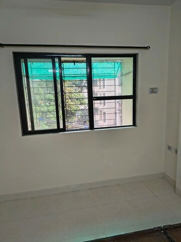 Room in 2 BHK Apartment at Cosmos Park, Ghodbunder Road – for Rent